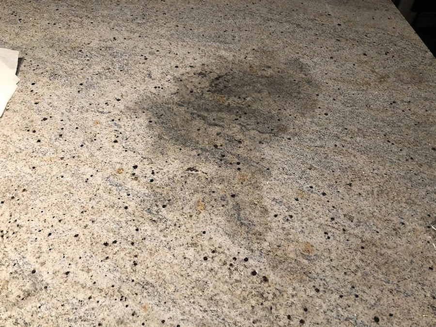 White Granite Flooring with Water Stains White Granite Flooring with Water Stains